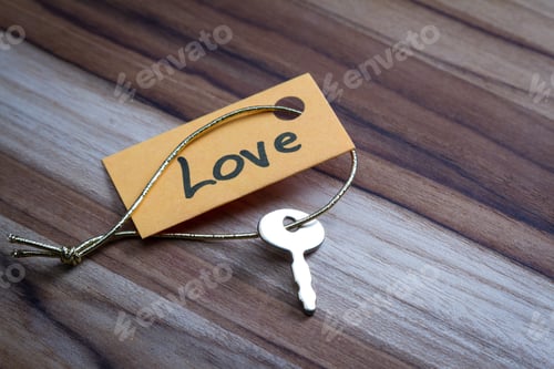 Preview: Concept For A Happy Loving Life Using An Old Decorative Key And A Hand Written Tag Attached By A