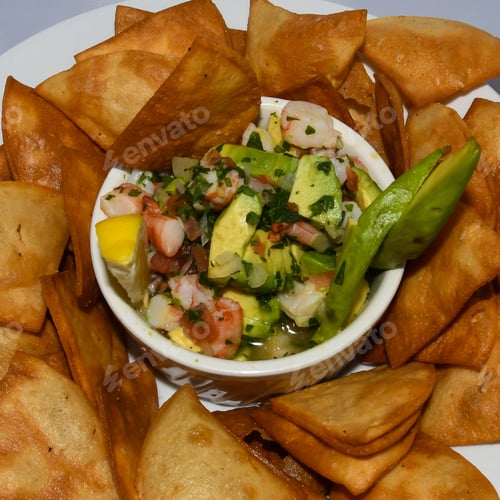 Preview: A View From Above Of Shrimp Ceviche Served With Homemade Chips