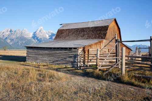 Preview: Barn In A Field Against A Mountain