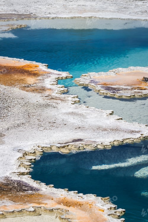 Preview: Close Up Of The Minerals Forming A Shell Over The Vibrant Blue Waters Near A Geyser