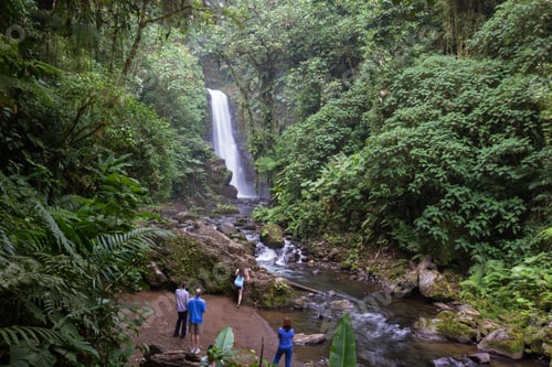 Preview: Alajuela, Costa Rica - May 02: Families And Friends Enjoying The View Of A Beautiful Waterfall In