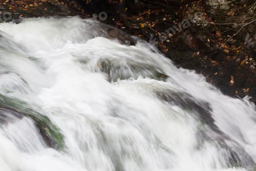 Preview: Cascading River Over And Around Rocks