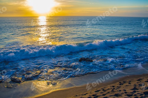 Preview: The Different Textures Of The Beach As The Tide Recedes And The Sun Reflects On The Wet Rocks And