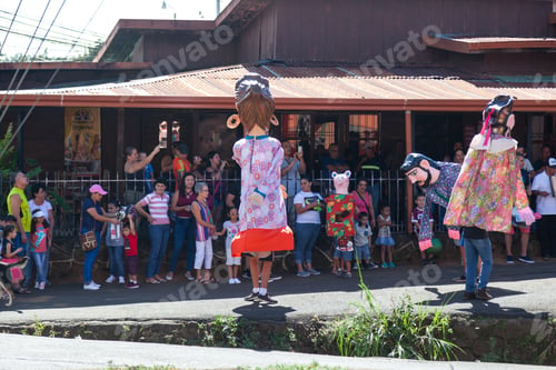 Preview: Barva, Costa Rica - January 27: Typical Masquerade With Families Watching The Show In The Shade