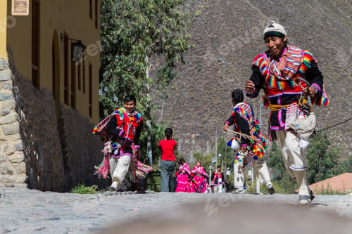 Preview: Ollantaytambo, Peru - May 16 : Religious Celebration For Fiestas De Pentecostes With People Wearing
