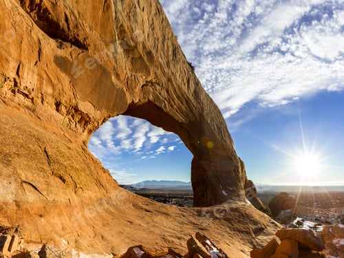 Preview: Wilson Arch, A Road Side Attraction South Of Moab Utah With Afternoon Light Reflecting On The