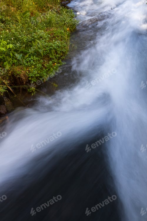 Preview: Close Up Of A Small Creek With Celan Water With A Slow Speed For A Rushing Effect