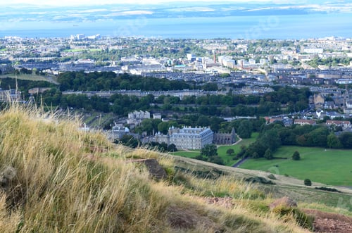 Preview: Looking Down At Edinburgh Scotland From Arthur'S Seat In Scotland.