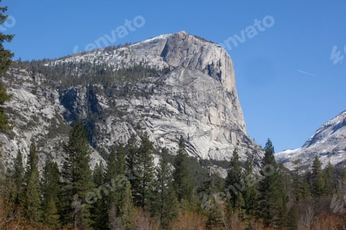 Preview: Mountain And Trees Of Yosemite Under A Blue Sky