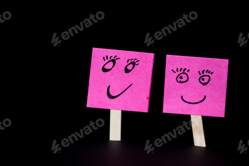 Preview: Sticky Notes With Hand Drawn Faces Over A Black Background For A Concept Of Same Sex Marriage