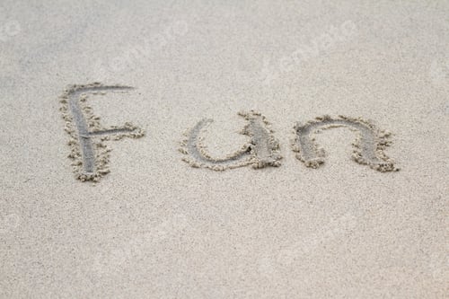 Preview: The Word Fun Written On Sand In A Tropical Relaxing Beach