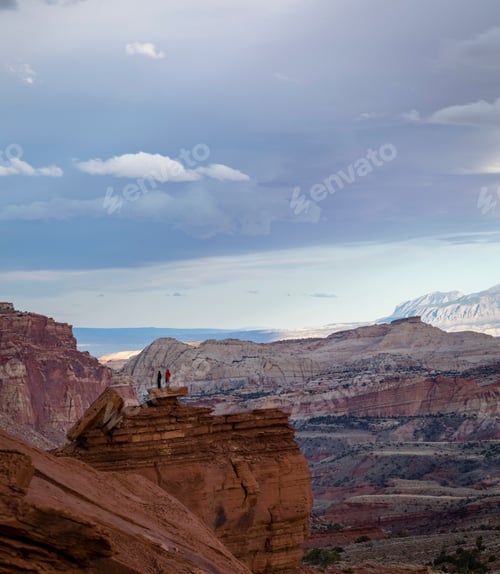 Preview: View Of Capitol Reef National Park In Spring Showing Rock Formations And Juniper Trees Against