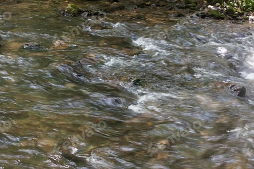 Preview: Stream Cascading Over Rocks And Stones