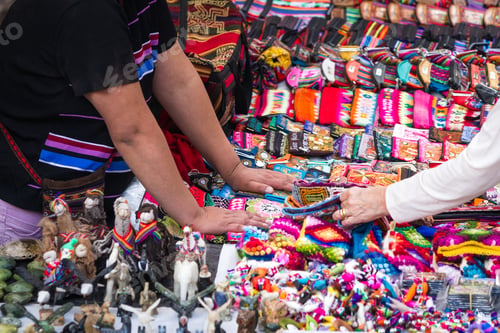 Preview: Close Up Of A Tourists Hand Shopping For Souvenirs At The Market In Pisac