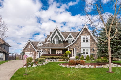 Preview: Beautiful Exterior Of Newly Built Luxury Home. Yard With Green Grass And Walkway Lead To Front