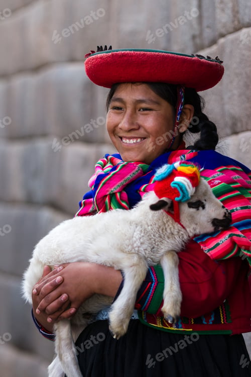 Preview: Cusco, Peru - May 14 : Jenni, A Young Woman Dressed In Colorful Traditional Native Peruvian Closing