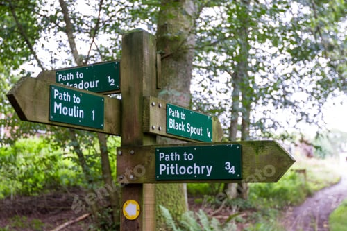 Preview: Footpath Signs In The Scottish Highlands Marking Distance And Direction