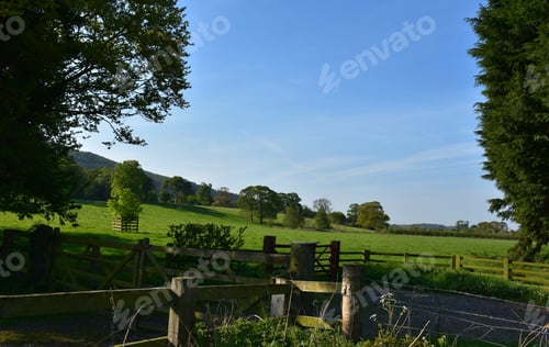 Preview: Farmland With Stunning Landscape And Rolling Grass Hills.