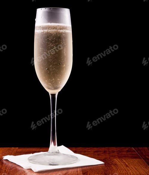 Preview: Champagne Flute Served With Sparkling Wine Isolated On A Black Background