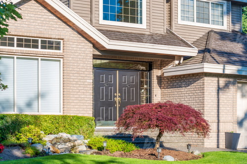 Preview: Fgrament Of Beautiful Exterior Of Newly Built Luxury Home. Yard With Green Grass And Landscape.