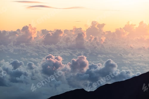 Preview: Colorful Sunrise On Top Of A Big Volcano With A View Over The Clouds. Shades Of Pink, Purple And