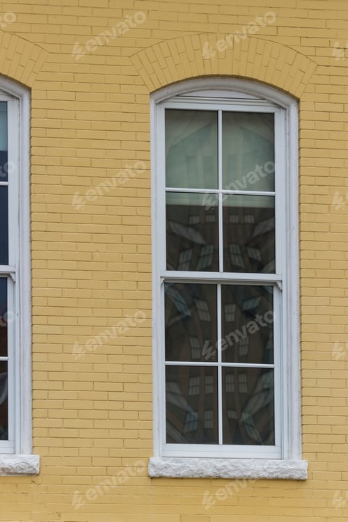 Preview: Old White Wood Frame Window In Yellow Brick Wall