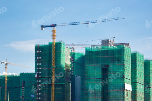 Preview: Image Of A Building In Progress With Security Net Around It. High Building In Progress.