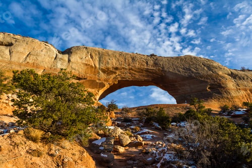 Preview: Wilson Arch, A Road Side Attraction South Of Moab Utah With Afternoon Light Reflecting On The