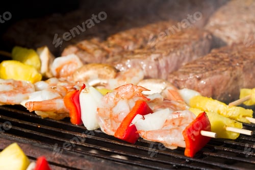 Preview: Grilling Shrimp Kabobs And Steaks On The Bbq On A Sunny Afternoon