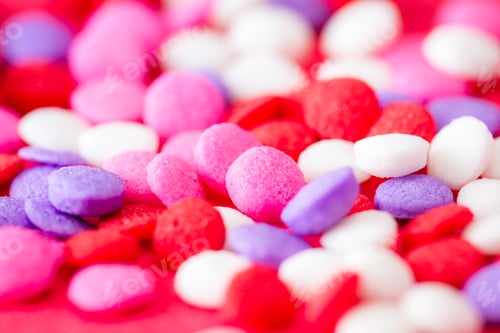 Preview: Macro Of A Group Of Small Edible Sugar Sprinkles In Different Hades Of Reds And White A Valentines
