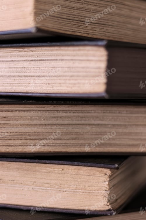 Preview: Stack Of Old Books With Rough Cut Deckle Edge Pages Selective Focus