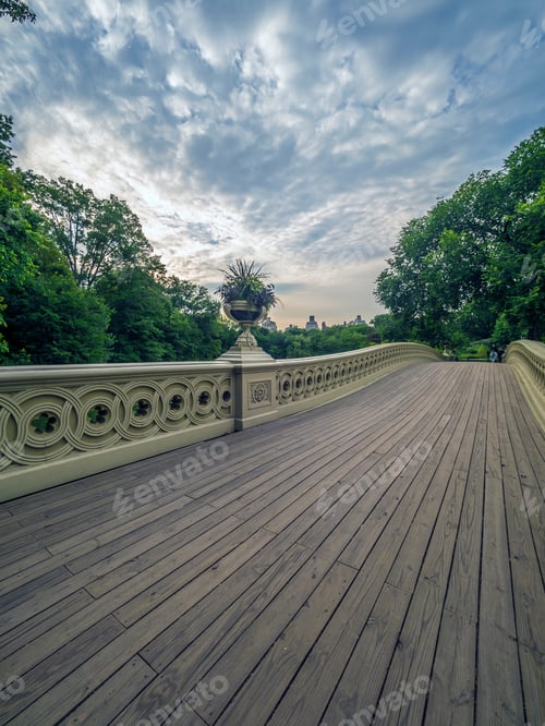 Preview: The Bow Bridge Is A Cast Iron Bridge Located In Central Park, New York City, Crossing Over The Lake