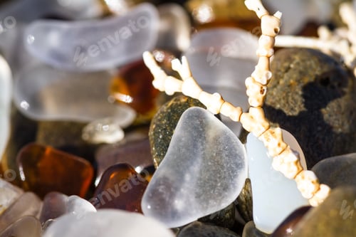 Preview: Macro Of A Colorful Group Of Sea Glass Pieces Under Bright Sunshine