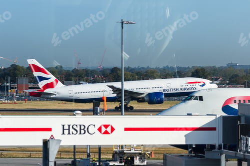 Preview: Heathrow, London Uk - September 19 2019: British Airways Plane Landing Viewed From The Lounge.