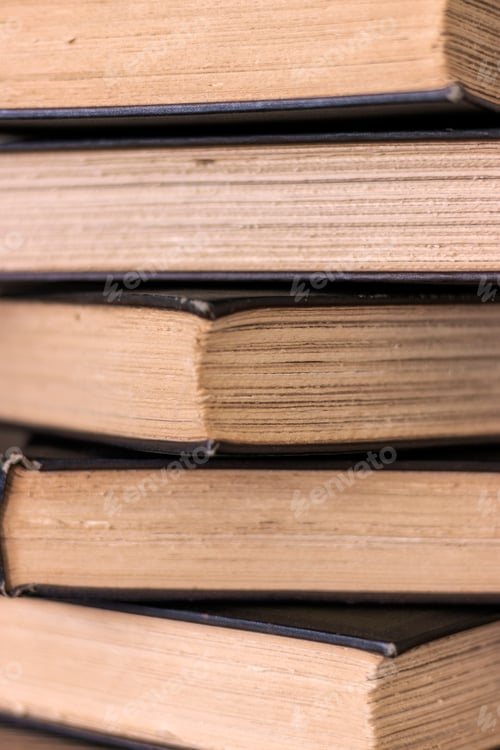 Preview: Stack Of Old Books With Rough Cut Deckle Edge Pages Selective Focus