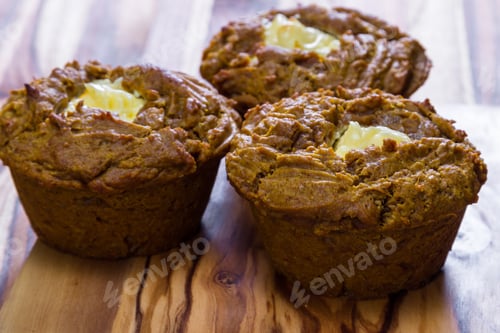Preview: Close Up Of A Home Made Pumpkin Muffin On A Wooden Background