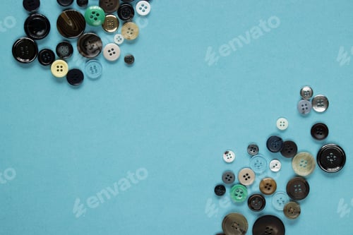 Preview: Multi Colored Clothes Sewing Buttons On Blue Background