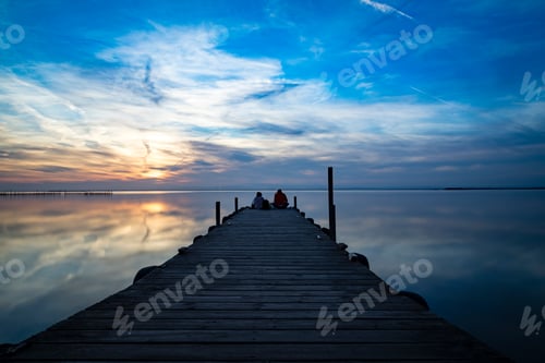Preview: Sunset Skies Over Pobles De Sud Near Valencia In Spain During A Winter Sunset Showing Golden And