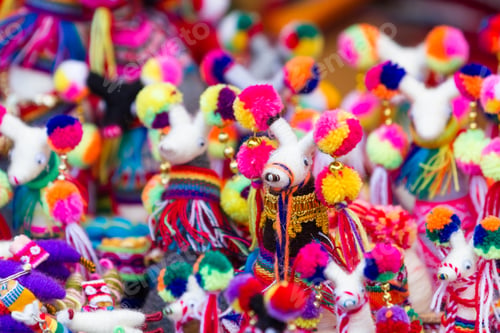 Preview: Close Up Of A Group Pf Dolls In A Variety Of Classic Peruvian Colors For Sale In The Market At Pisac
