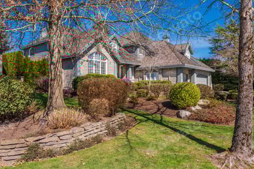 Preview: Beautiful Exterior Of Newly Built Luxury Home. Yard With Green Grass And Walkway Lead To Ornately