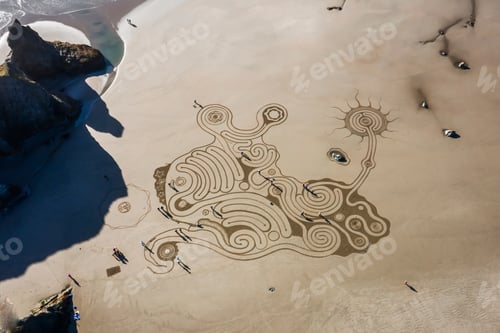 Preview: Bandon By The Sea, Oregon / Usa - February 20 2020: The Team Of Circles In The Sand Drawing A