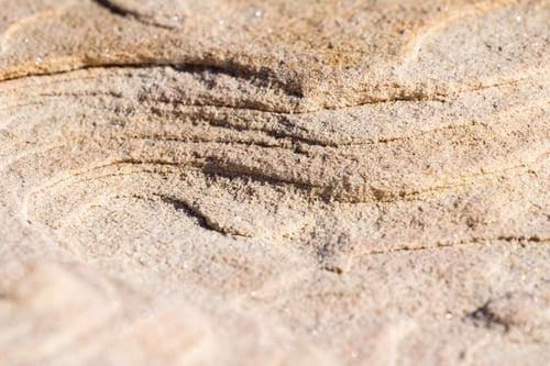 Preview: Close Up Of A Broken Section Of Sandstone With A Multitude Of Layers Eroding With The Wind And