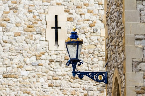Preview: Blue Street Light In The Tower Of London With Gold Leafing And An Arrow Slit In The Background