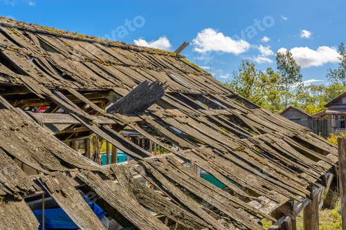 Preview: An Old Roof Of A House In Disrepair.
