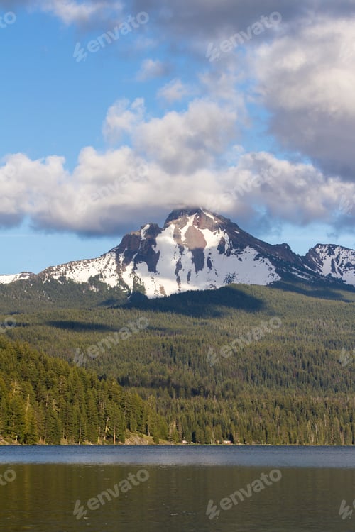 Preview: View Of Mount Thielsen In Oregon With Clouds And Fog Surrounding The Peak