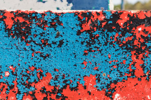 Preview: Multiple Layers Of Peeling Paint On A Metal Beam