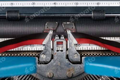 Preview: Macro Detail Of The Ink Ribbon And Text Of Electric Typewriter With No Paper Inserted