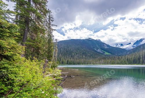 Preview: View At Mountain Lake With Dramatic Clouds In British Columbia, Canada.