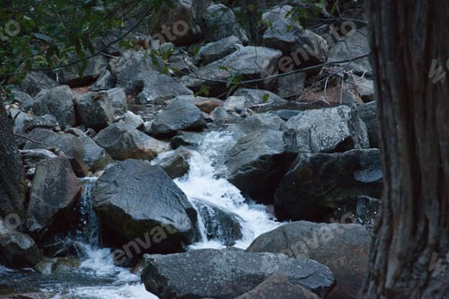 Preview: Stream Cascading Over And Around Rocks