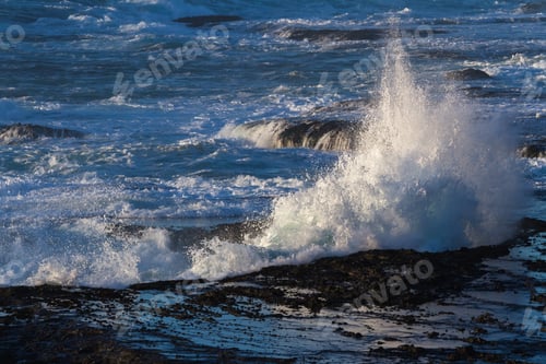 Preview: Powerful Scene With Crashing Waves Creating A Dramatic Explosion On This Lava Rock Bluffs